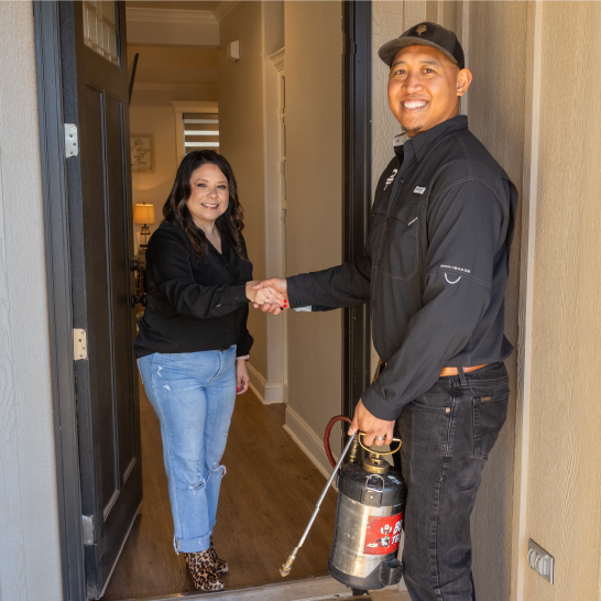 Technician greeting homeowner